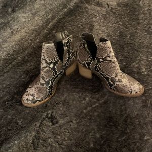 Snake print ankle boot.